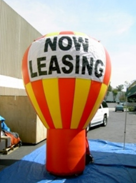 Orange Yellow Rooftop Ad Now Leasing Balloon