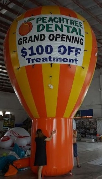 Orange Yellow Rooftop Ad Peachtree Dental Grand Opening Balloon