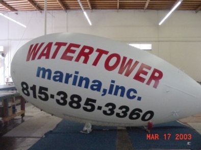 White Advertising Watertower Marina Blimp
