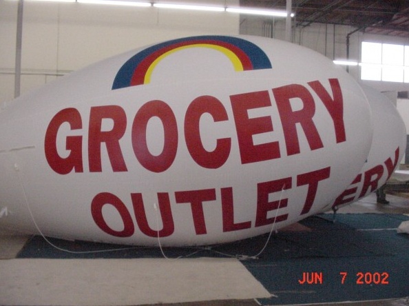 White Red Advertising Grocery Outlet Blimp